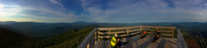 Andrew (left) and Michael (right) take a break on top of the fire tower before setting up camp on the summit.
